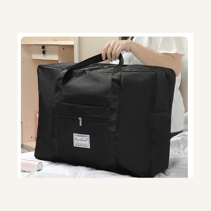 Black medium foldable travel duffel bag with reinforced straps