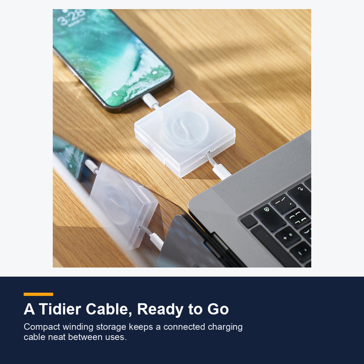 Square translucent rotating cable winder case on a desk