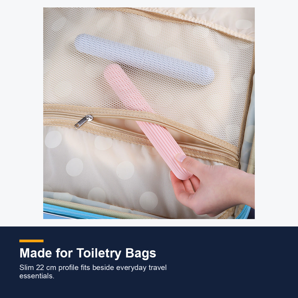 Pink and Mint Green toothbrush cases inside a travel toiletry bag