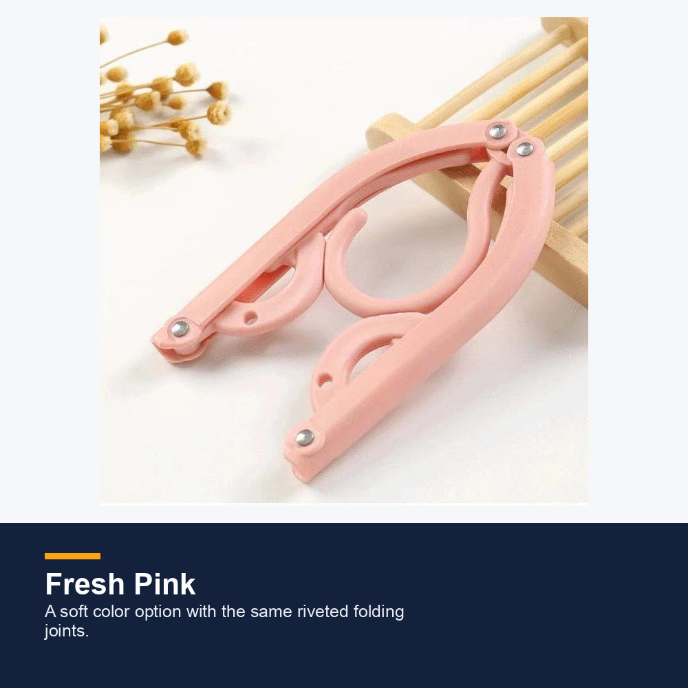 Pink compact folding travel hanger