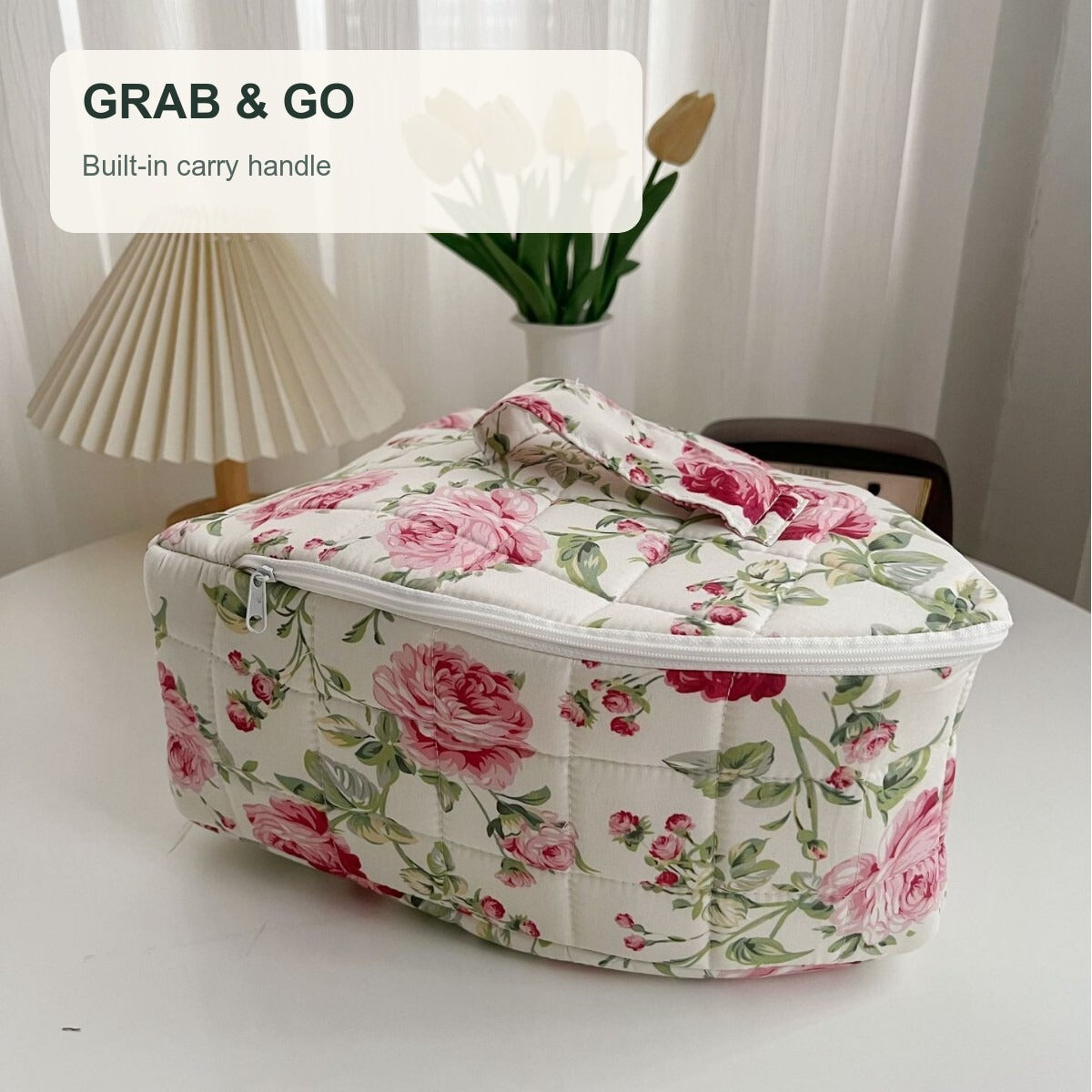 Built-in carry handle on the quilted travel iron bag