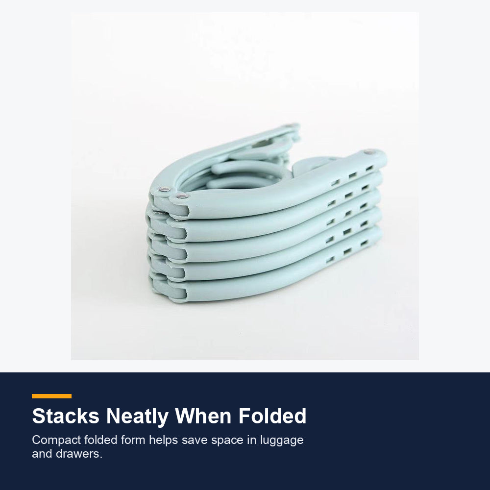 Travel hangers stacked in folded form