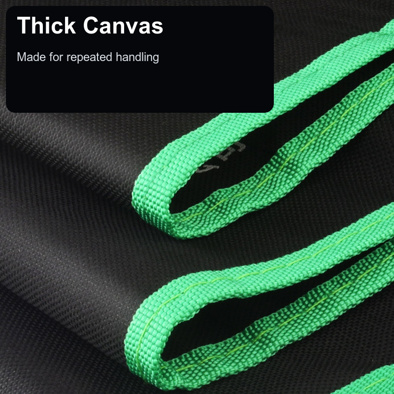 Close-up of thick black canvas and green binding loops